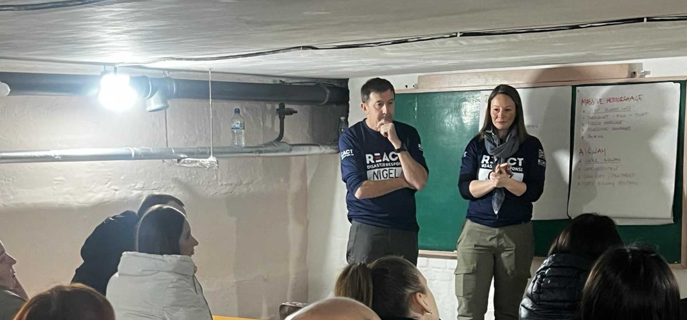 Caz Nigel training in a bunker.jpeg