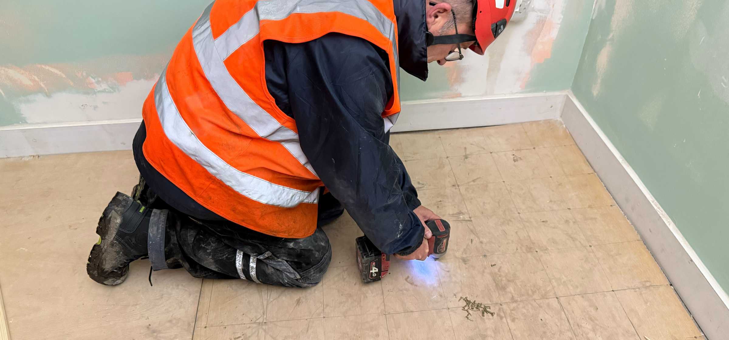 Mark Davies undertaking sub flooring (3).jpg